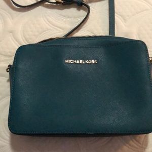 Michael kors small crossbody bag.